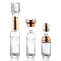 Ensemble d'emballages de luxe en verre pour soins de la peau : flacon pompe pour lotion, compte-gouttes pour sérum, pot à crème, conteneur cosmétique vide pour présentation