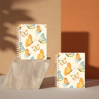 Cahier de revue à spirale à couverture en PVC de taille A5 le plus vendu pour les étudiants à utiliser au bureau 100 feuilles intérieures avec logo personnalisable