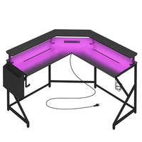 Grand bureau de jeu noir en forme de L avec lumières LED et prises de courant table de jeu pour PC gamer pour bureau à domicile