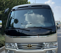 Minibus d'occasion d'origine japonaise pour transport de personnes, 16 places, moteur puissant, idéal pour le tourisme et les groupes.