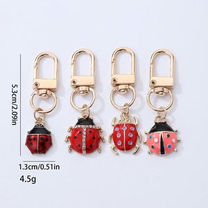 Creative Women's Bag Small Fresh <b>Key</b> Pendant Seven Star Ladybug Inlaid Diamond Metal Keychain - Product Image 3