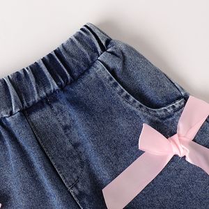 Completo due pezzi da <span class=keywords><strong>ragazza</strong></span> casual: giacca a maniche corte con nappe e strass, e shorts in denim con fiocco - Product Image 6