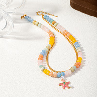 Collier ras du cou tendance pour femme avec pendentif étoile de mer en pierre naturelle et chaîne dorée colorée, idéal pour l'été et la plage
