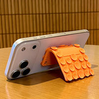 Support de téléphone en silicone flexible de style nouveau, pliable et anti-vibration, support de téléphone à ventouse pour bureau