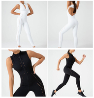 Vêtements de Yoga à la mode blanc creux sculpté conception Non voir à travers combinaison col haut fermeture éclair maigre costume de sport femmes vêtements de sport Onesie