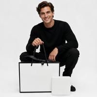 Sac de courses pliable en papier d'art biodégradable de luxe, avec logo personnalisé, sac cadeau pour fête, vente en gros de vêtements et chaussettes, avec lamination