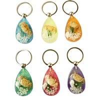 Porte-clés d'océan de crabe à la mode avec fond de lumière de nuit véritable insecte spécimen de crabe d'ambre matériel en caoutchouc en gros disponible