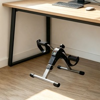 Mini-vélo d'exercice silencieux et compact pour le bureau – Équipement de fitness pour les travailleurs sédentaires et l'entraînement des jambes