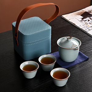 Juego de Té de Cerámica Portátil para Viaje Ge Kiln, Gaiwan, Tres Tazas, Set de Regalo para Uso en Exteriores - Product Image 1