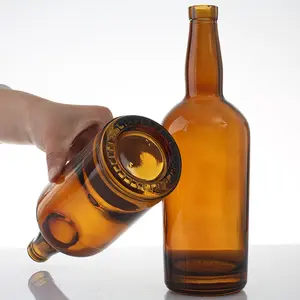 Fornitore di fabbrica di vetro ambrato contenitore di alcool trasparente 330 ml bottiglia di birra di vetro con tappo a corona