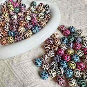 Nouveaux accessoires de bijoux DIY, perles imprimées léopard bicolores, perles en bois mélangées, pampilles en bois, perles en vrac, perles transfrontalières, entièrement métalliques - Product Image 1