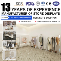 Présentoir Mural de Magasin en Acier Inoxydable Doré de Luxe Sur Mesure pour Vêtements, Design d'Équipements de Magasin de Détail Tendance pour Dames