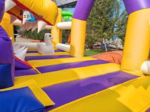 Neues Design Aufblasbares Dinosaurier-Geheim reich Thema Hüpfburg Aufblasbares springendes Türsteher haus für Park vermietung im Freien - Product Image 5