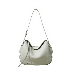 Nouveau Sac à bandoulière et à l'épaule en cuir véritable haut de gamme avec fermeture éclair, collection Printemps 2026, polyvalent pour femme - Product Image 1