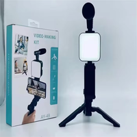 Kit de tournage vidéo pour téléphone AY-49 disponible en OEM, trépied pieuvre + lumière LED + ensemble de microphones pour vlog et création de contenu
