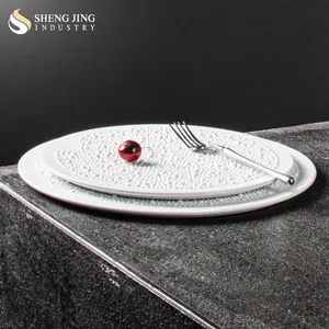 Shengjing OEM piatto da cena in ceramica bianca con perla ristorante Hotel in porcellana rotonda vassoio da portata piatti e piatti di lusso per matrimoni