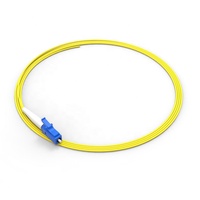 G652d G657A1 PVC LSZH ekor babi serat optik 0.9mm SM/MM/OM3/OM4 peralatan serat optik dengan LC/SC UPC