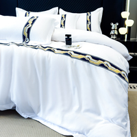 Ensemble de literie Gaoke de qualité supérieure en polyester pour hôtel et gîte, avec ruban adhésif, blanc pur, bord large, 4 pièces, 200TC