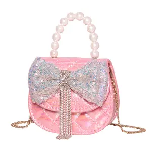 Grenzüberschreitende Tasche Kindertasche Mädchen große Schleife leuchtender Diamant Quaste Mode Bote-Tasche kleines Mädchen Mini-Handtasche
