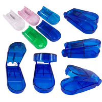 Coupe-pilules en plastique écologique, vente directe usine, étui diviseur de comprimés, boîte de voyage pour médicaments, outil de découpe de pilules à lame tranchante