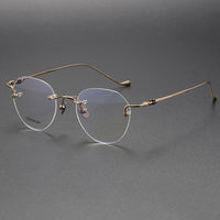 Montures de lunettes de luxe vintage tendance en titane pour hommes, sans monture, finition or, motif imprimé or, verres AC, en ligne