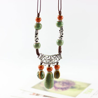 Long collier en céramique Vintage style ethnique minimaliste pendentif vêtements polyvalent décoratif chaîne de saut pour femmes