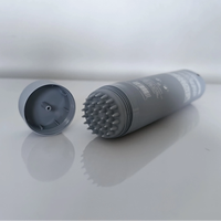 Tubes vides de masque de cheveux de 100ml avec le tube en plastique de PE de brosse de massage de silicone pour le sérum de soin de cheveux