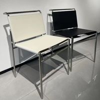 Chaise de salle à manger de style européen, mobilier de café moderne de luxe, chaise de cuisine en acier inoxydable avec accents bouclés et pieds dorés