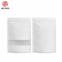 Sacs d'emballage en papier kraft blanc refermables de haute qualité avec fenêtre et logo personnalisé, conçus pour les aliments, les bonbons et les collations.