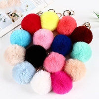 Venta al por mayor 8 cm tamaño bolsa coche y teléfono móvil decoración POM llavero 51 colorido en stock suave conejo peludo llavero