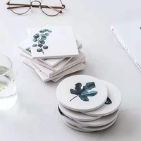 Dessous de verre absorbants en céramique avec motif de feuille noir pour ensemble de tapis et de tampons de table en bois pour boissons