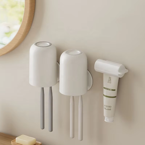 Wholesale Plastic <b>Toothpaste</b> Squeezer Facial Cleanser Hand Manual Seat Holder Stand Rotate Tool - Product Image 5