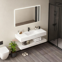 Meuble-lavabo mural multifonctionnel en marbre de style européen moderne avec miroir intelligent et vasque en céramique pour hôtels et appartements
