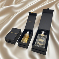 Boîte personnalisée de luxe en papier magnétique enduit en forme de livre de parfum avec insert en éponge pour l'emballage de flacons en verre, logo personnalisé