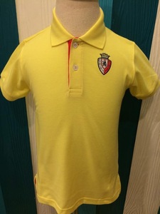 Camisa polo clásica con mangas acanaladas de color blanco, cuello a rayas y un bolsillo en el pecho, hecha de TC Pique 35% algodón 65% poliéster. - Product Image 2