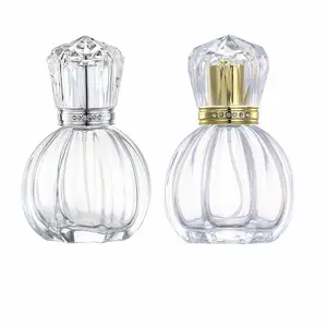 Flacon pulvérisateur en verre de 50ml, citrouille incrustée de brique dorée/argentée, sous-bouteille de parfum, pompe rechargeable, bouteille vide en forme de parfum transparent