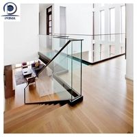 Système de balustrade en verre moderne Prima avec design sans cadre pour balcon, escalier et projets d'intérieur résidentiel