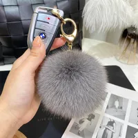 12cm véritable boule de fourrure de renard poms porte-clés pour femmes luxe pompon porte-clés accessoires sac décoration Emo bibelot bijoux cadeaux