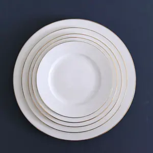 Bone china dinnerware set elegant design custom logo hotel wedding white ceramic dinner plate with gold rim