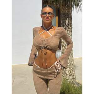 ชุดเซ็ตไหมพรมผู้หญิงแบบ 2 ชิ้น รุ่นคัสตอม 2026 เสื้อครอปแขนยาว กางเกงขาบานผูกเชือก ระบายอากาศได้ดี เหมาะสำหรับใส่พักผ่อน - Product Image 5