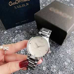 Montre-bracelet en alliage de Genève pour femmes Bracelet en acier inoxydable Montre transfrontalière Fourniture Mode Performance Quartz Montre à breloques pour femmes - Product Image 5