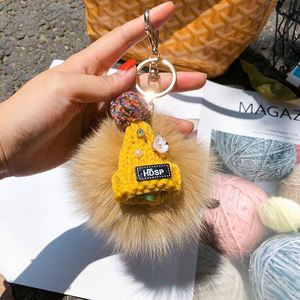 New Elegant Faux Fur Hairball <b>Key</b> <b>Chain</b> Cute Hat <b>Key</b> Ring Soft Fluffy Ball Purses Phone Charm - Product Image 2