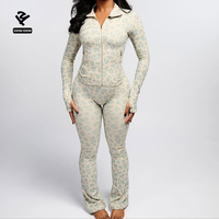 Ensemble de survêtement OEM imprimé léopard à fermeture éclair, deux pièces, haut moulant à trous pour les pouces, pantalon évasé taille haute, pour le fitness, la gym et le jogging