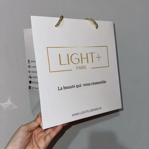 Hồng phấn hồng tùy chỉnh vàng dập nổi logo nâng 3D với ruy băng nơ quà tặng bao bì túi giấy - Product Image 3