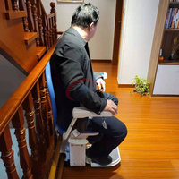Plateforme élévatrice pour escalier / Fauteuil monte-escalier électrique à rail courbé pour personnes âgées / Monte-escalier