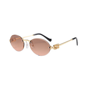 Gafas de sol ovaladas sin montura para mujer, de metal, estilo retro, protección UV400, moda para adultos - Product Image 1
