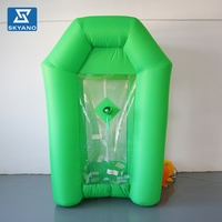 Modèle de stand gonflable personnalisé pour machine à gagner de l'argent, idéal pour événements commerciaux, jeu attrape-billets et accessoire publicitaire interactif