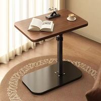Table basse pivotante relevable au design moderne avec structure en métal pour salon et chambre à coucher