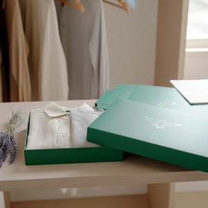 Custom Magnetic Closure Gift <b>Box</b> Flat Pack Kraft Apparel Packaging <b>Box</b> with Embossed Logo - Product Image 1