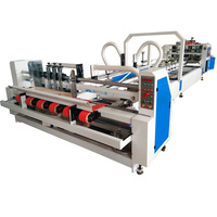 Machine entièrement automatique de collage et d'agrafage de cartons / Plioir-colleuse-agrafeuse pour boîtes en carton ondulé